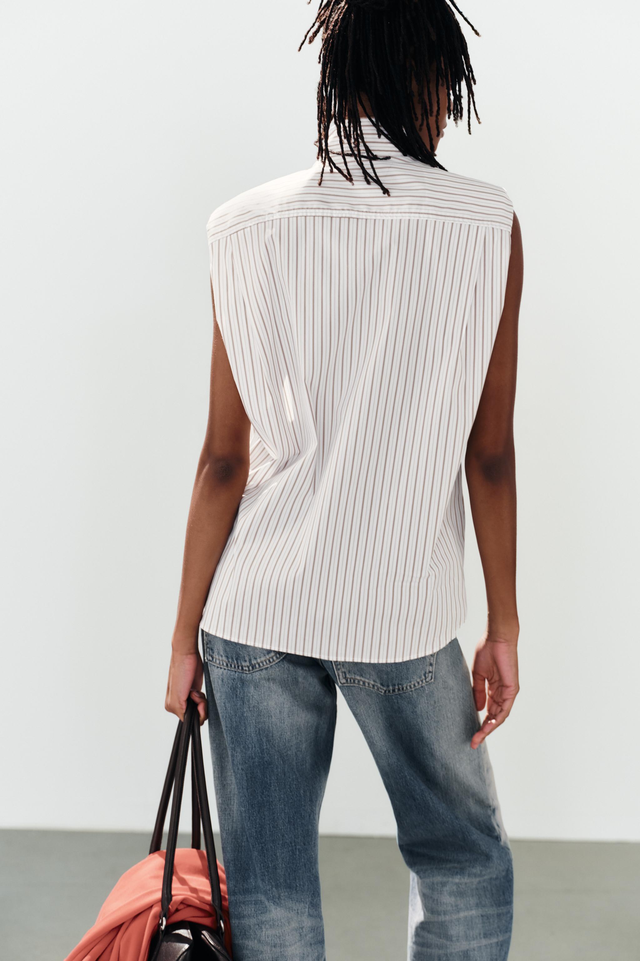 STRIPED TIE-NECK SHIRT WITH SHOULDER PADS